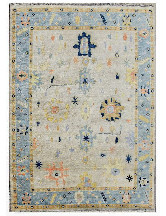 Ivory & Light Blue Bordered Tribal Oushak Rug