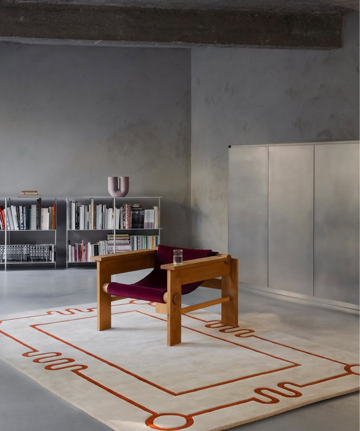 Cream and terracotta geometric hand tufted rug with modern linear abstract design in contemporary interior