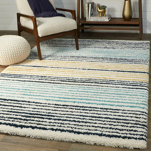 Multicolor shaggy area rug with cream, teal, black and mustard horizontal stripes